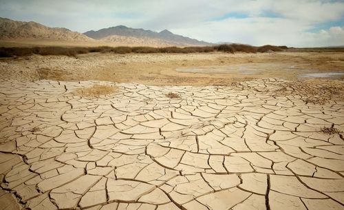 Scenic view of desert against sky