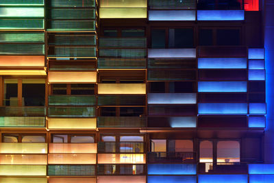 Low angle view of illuminated building in city