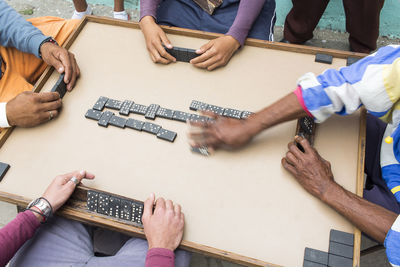 High angle view of people on table