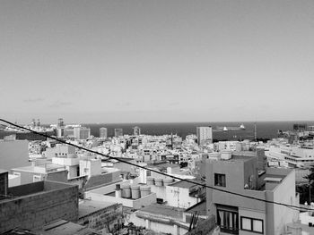 High angle view of buildings in city against sky