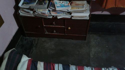 High angle view of books on table at home