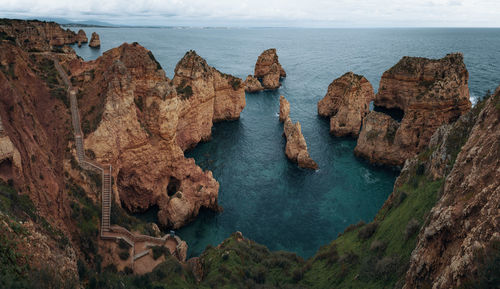 High angle view of rocks in sea