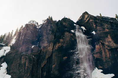 Scenic view of rocky mountains against clear sky