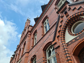 Low angle view of historic building against sky