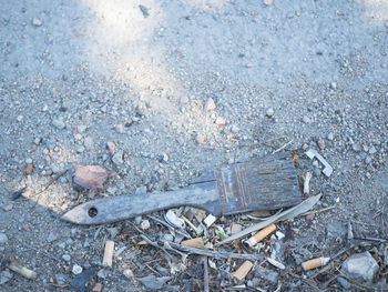 High angle view of abandoned car on road