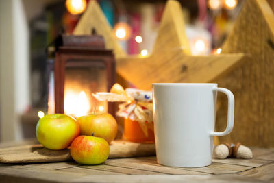 Fruits and coffee on table