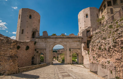 Old ruin building against blue sky