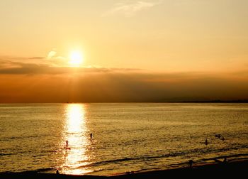 View of calm sea at sunset