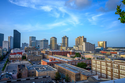 Buildings in city against sky