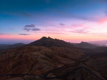 Scenic view of mountains during sunset