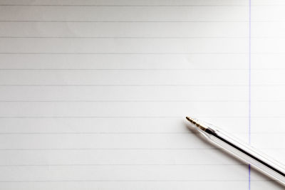 Close-up of pen on paper
