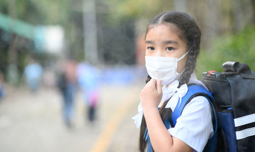 Portrait of girl holding outdoors