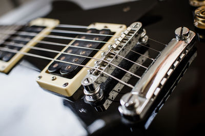 Close-up of black guitar