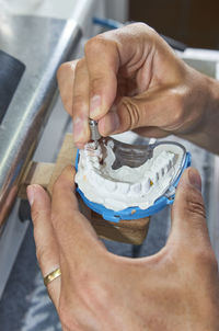 Midsection of person holding ice cream