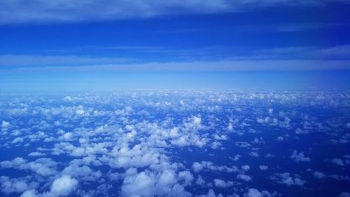 Aerial view of cloudscape against blue sky