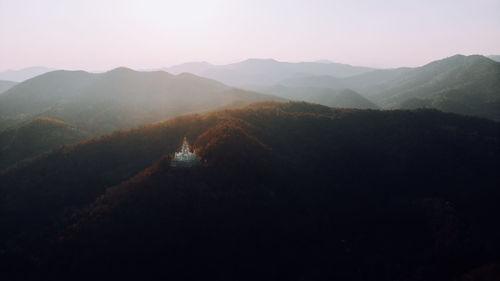 Scenic view of mountains against sky during sunset