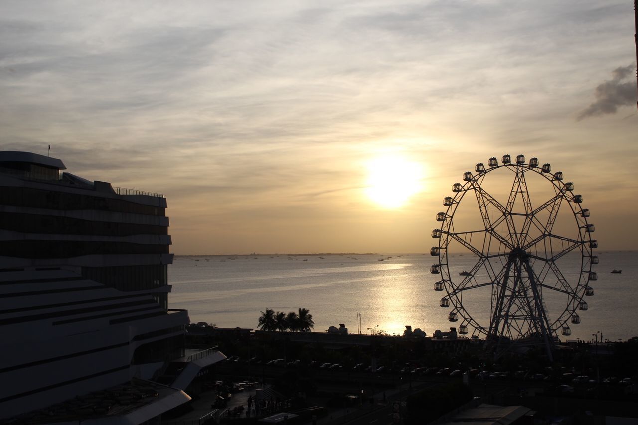 SCENIC VIEW OF SUNSET OVER SEA