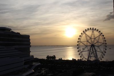 Scenic view of sea against sky at sunset