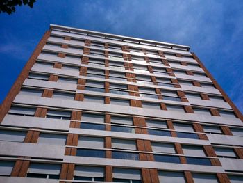 Low angle view of building against blue sky
