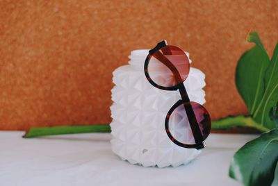 Close-up of sunglasses on table