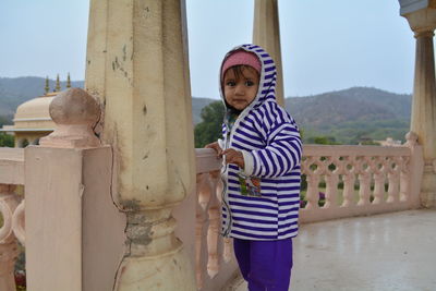 Full length of boy standing outdoors