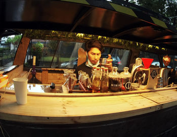 Portrait of man sitting at restaurant table