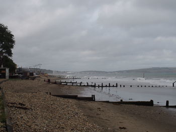 Scenic view of beach against sky