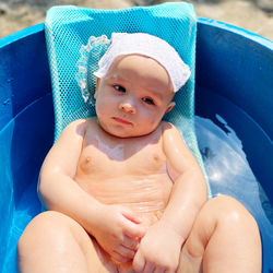 Cute baby boy in tub