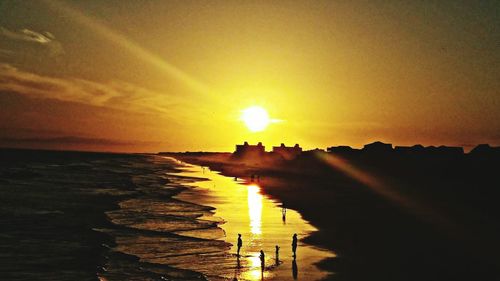 Scenic view of sea at sunset