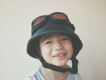 Portrait of smiling boy wearing helmet