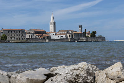 Porec waterfront with rocks in the front
