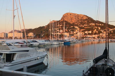 Boats moored in harbor