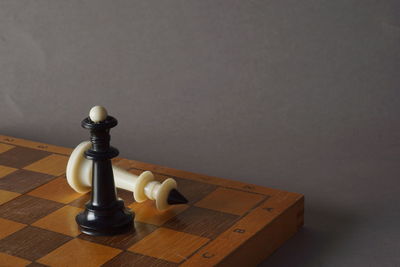 High angle view of chess pieces on table