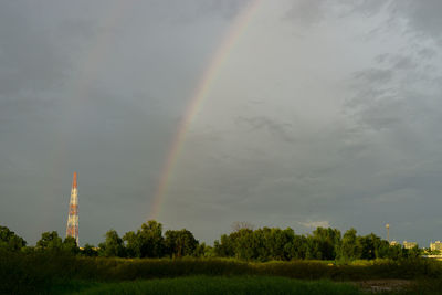 Low angle view of rainbow against sky