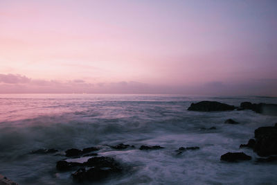 Scenic view of sea at sunset