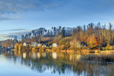 Scenic view of lake against sky during autumn