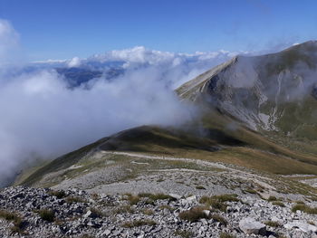 Scenic view of volcanic mountain against sky