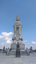 Low angle view of statue against sky