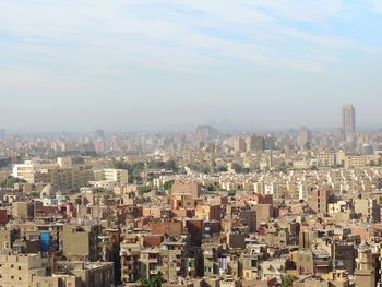 High angle view of buildings against sky