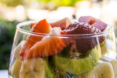 Close-up of fruit salad served in wineglass