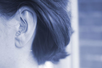 Close-up of woman wearing hearing aid