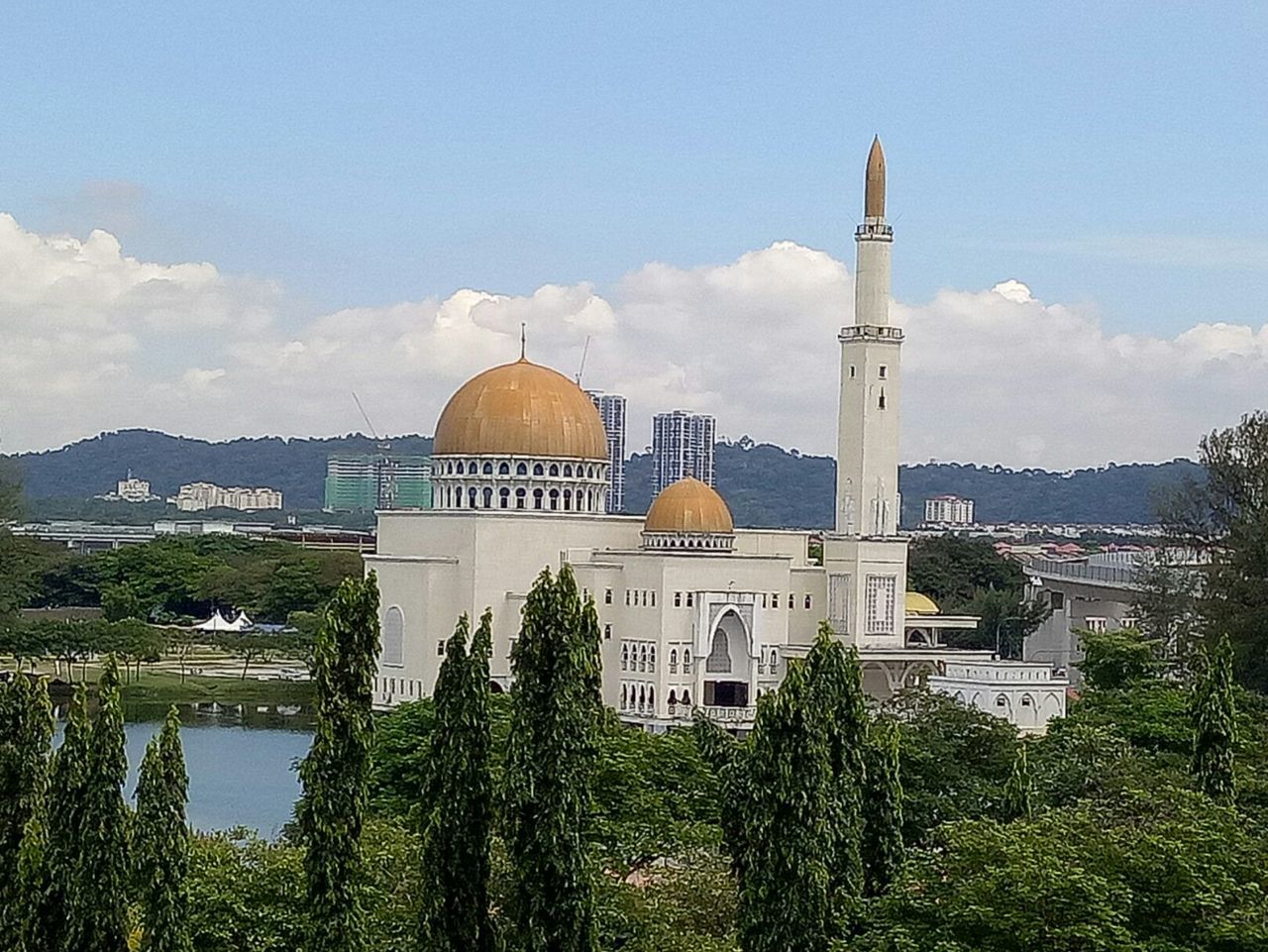 dome, religion, architecture, place of worship, spirituality, sky, day, built structure, outdoors, no people, water, building exterior, tree