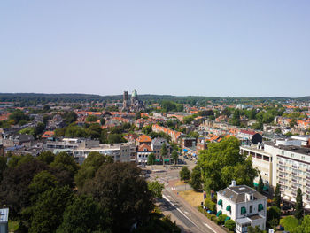 High angle view of buildings against clear sky