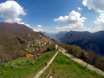 High angle view of landscape and buildings against sky