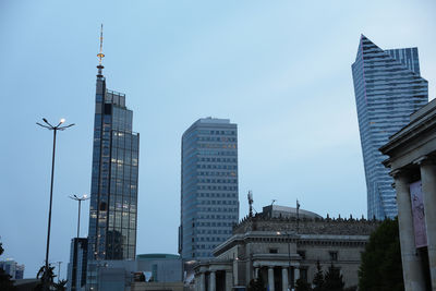 Low angle view of skyscrapers against sky