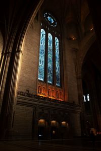 Low angle view of illuminated window in building