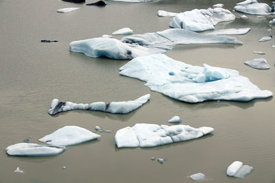 High angle view of iceberg in sea