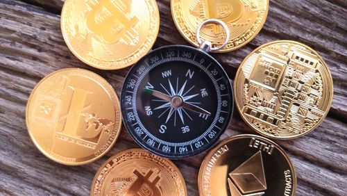 Close-up of coins on table