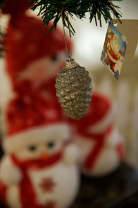 Close-up of christmas decoration hanging on tree