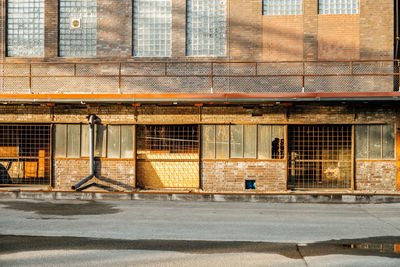 Footpath by building in city